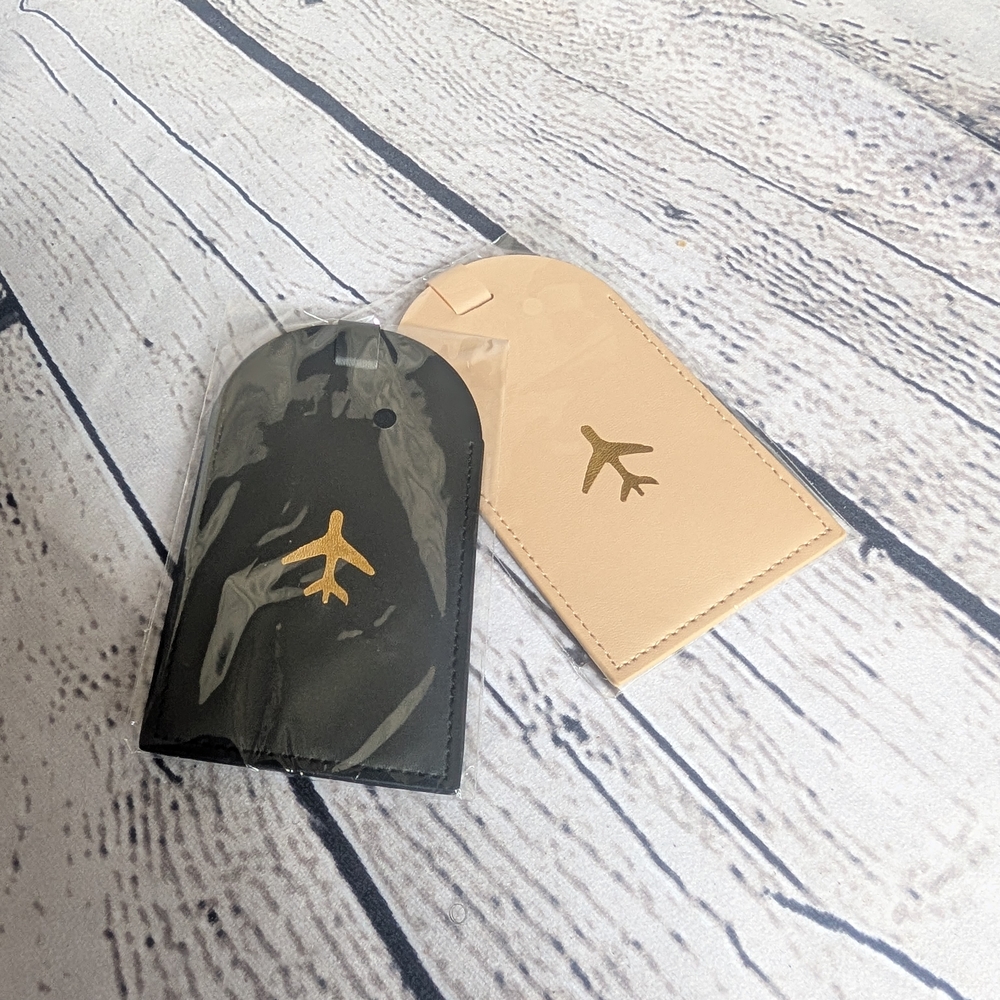Elegant Black and Tan Luggage Tags with Gold Airplane